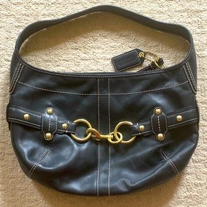 Authentic Coach shoulder bag. Black with brass hardware.